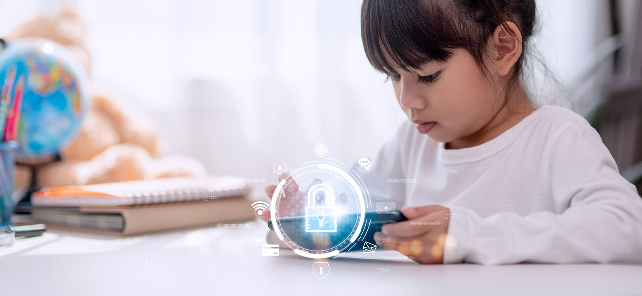 Image: Student using a tablet with cyber-security icons.